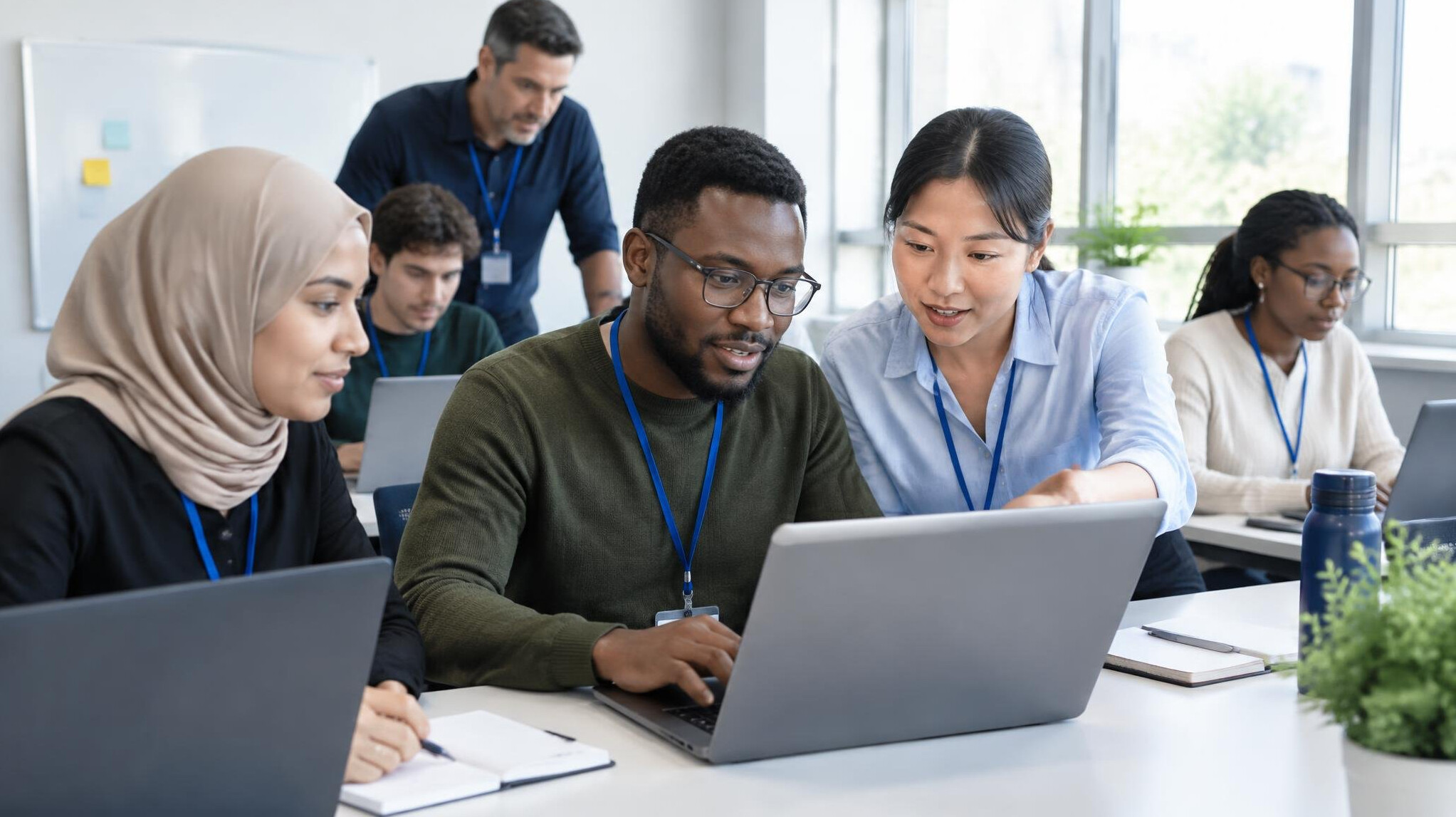Group of professionals in a hands-on training workshop
